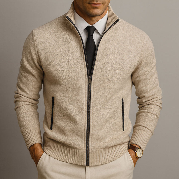 Theodore stand collar full zip knit cardigan in beige, front view with hands in pockets