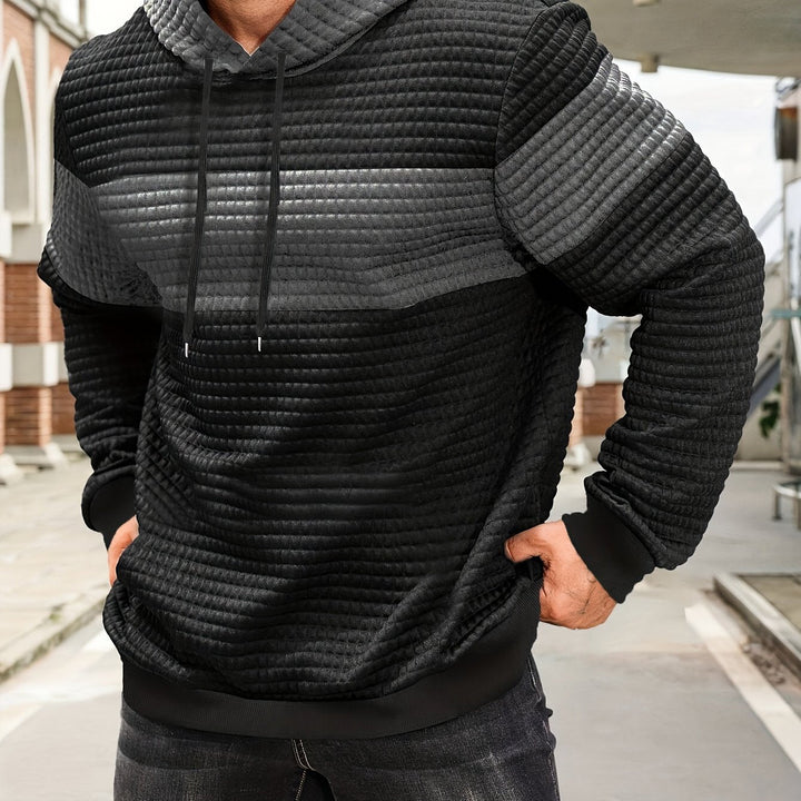 Tobias textured colorblock pullover hoodie in dark gray, front view close-up