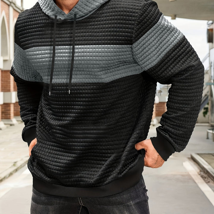 Tobias textured colorblock pullover hoodie in haze blue and black, flat back view