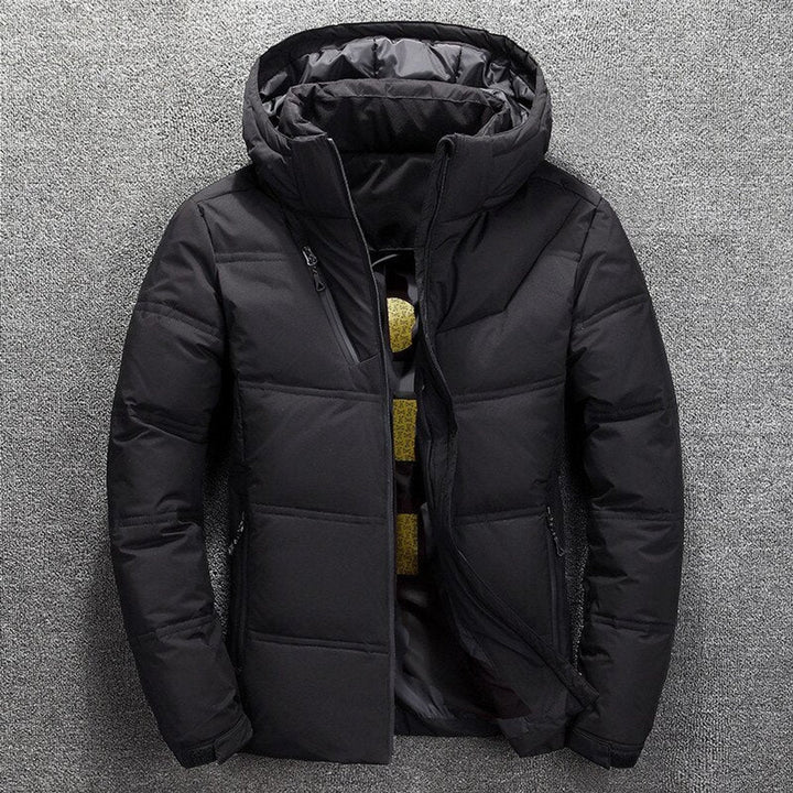 Vincent puffer jacket in black, front view with hood attached