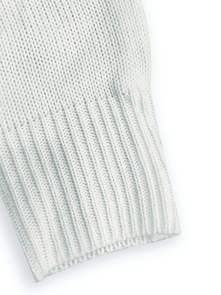 Close-up of ribbed hem texture in cream colorway