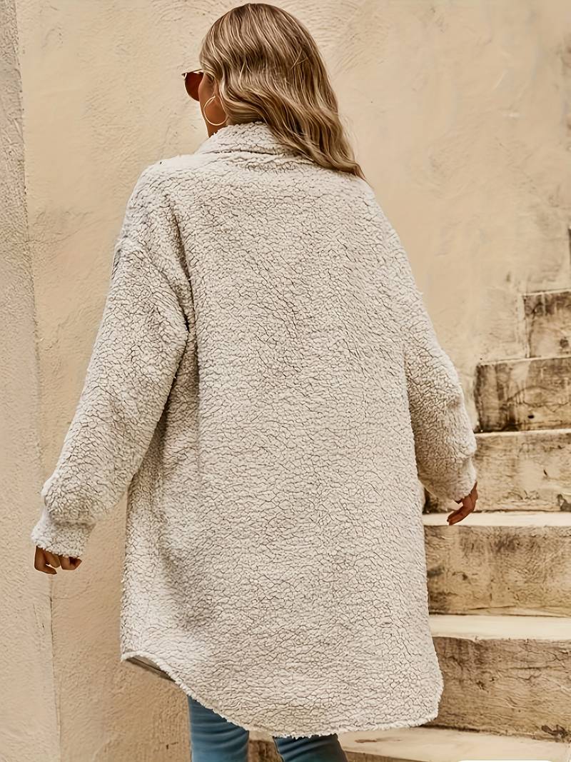 Wilhelmina longline teddy coat, back view on stairs