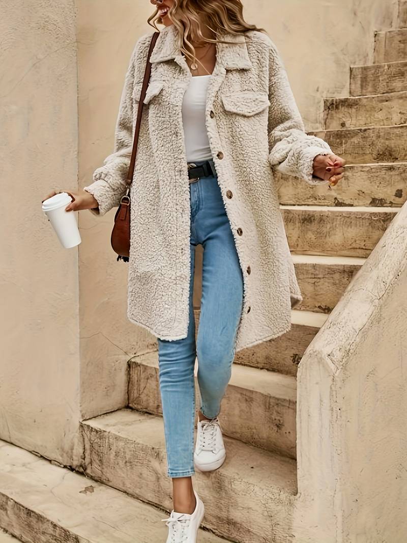Wilhelmina oversized teddy coat styled with jeans, full length