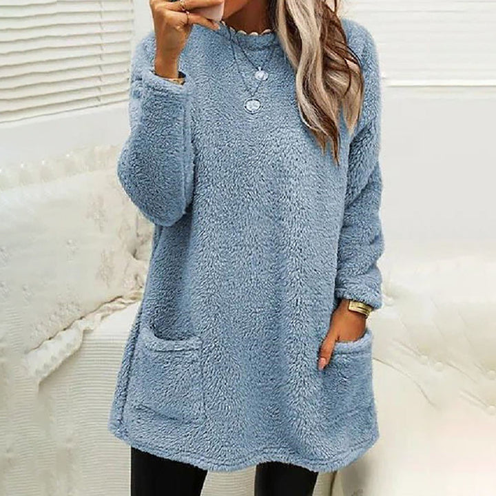Winnifred cozy pocket sweater in navy blue, front view