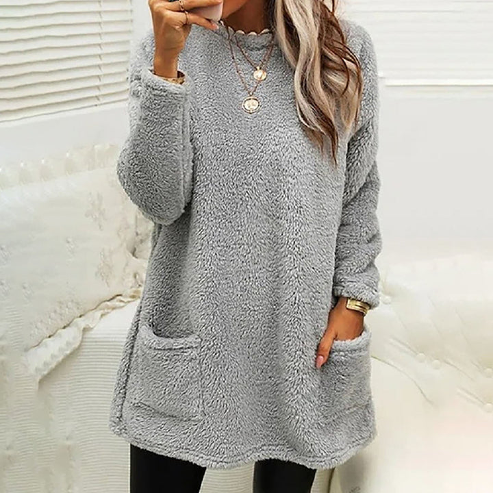 Winnifred cozy pocket sweater in navy blue, front view