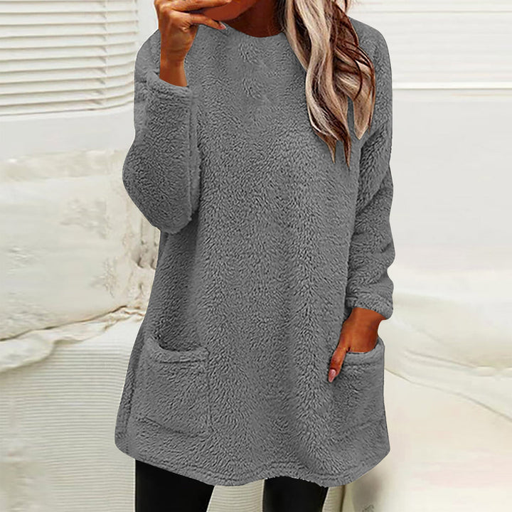 Winnifred cozy pocket sweater in navy blue, front view