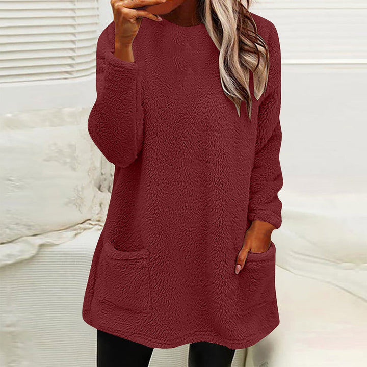 Winnifred cozy pocket sweater in navy blue, front view