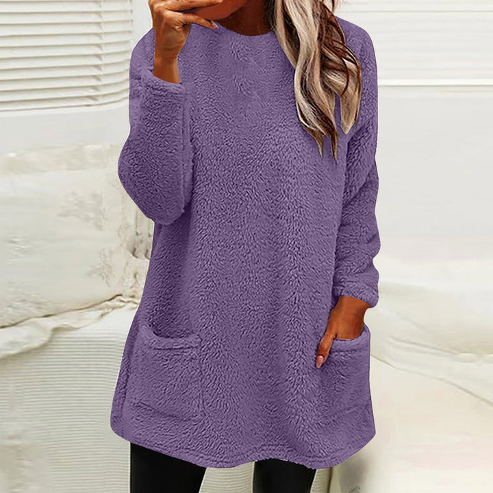Winnifred cozy pocket sweater in navy blue, front view