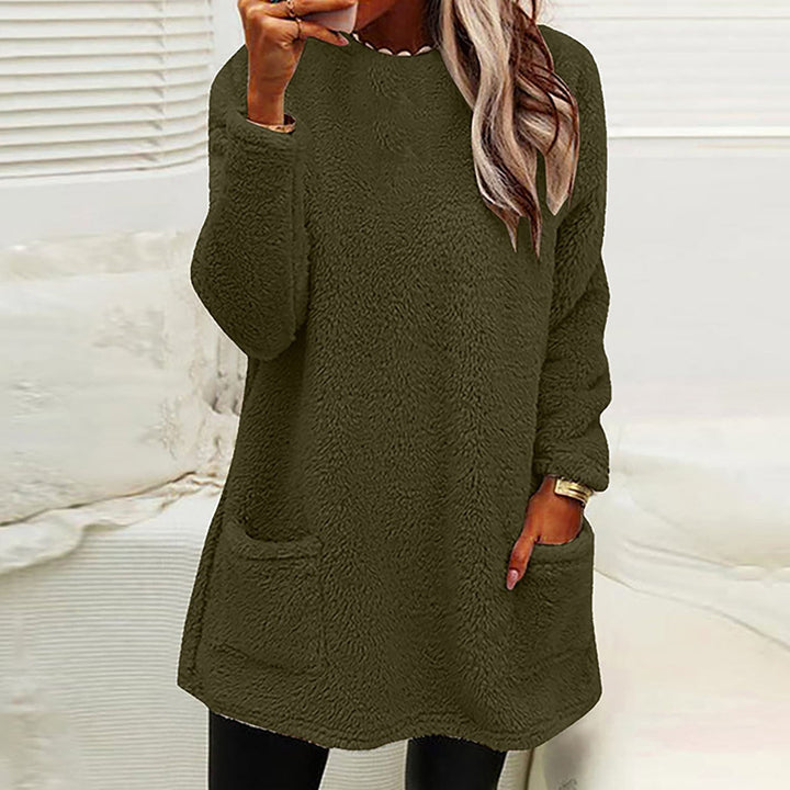 Winnifred cozy pocket sweater in navy blue, front view