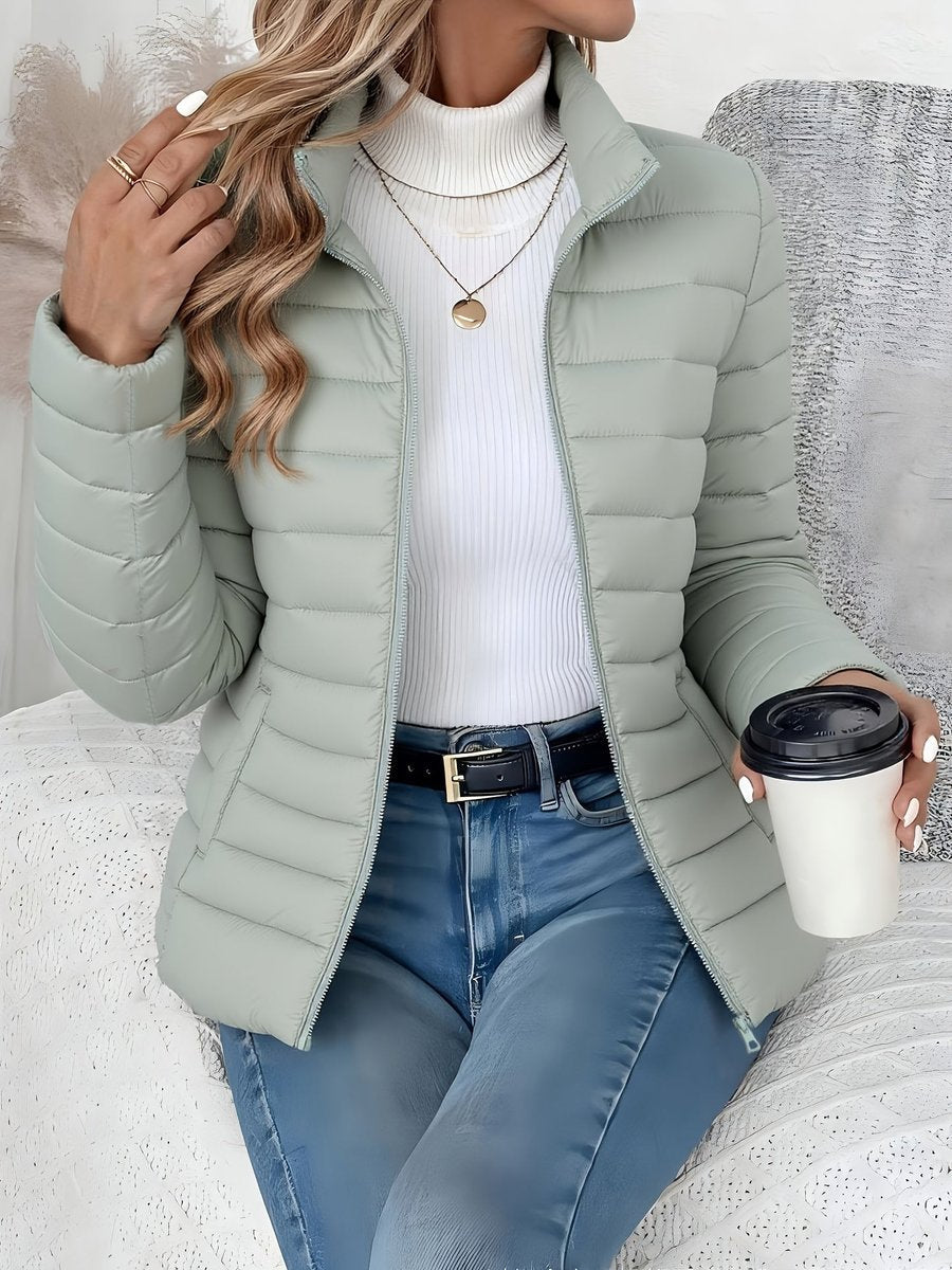 Wren quilted puffer jacket in sage green with stand collar, front view